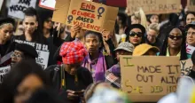 Protesters march against gender-based violence in front of the Johannesburg Stock Exchange, South Africa, September 13, 2019. © 2019 Alet Pretorius/Gallo Images via Getty Images
