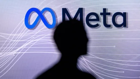 Meta's logo behind a (regulator`s?) suspicious glance.