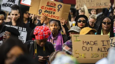 Protesters march against gender-based violence in front of the Johannesburg Stock Exchange, South Africa, September 13, 2019. © 2019 Alet Pretorius/Gallo Images via Getty Images