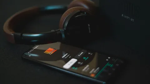 Headphones beside phone