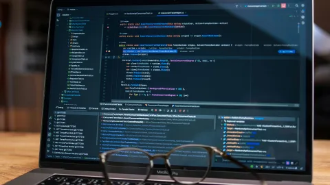 Laptop screen with glasses