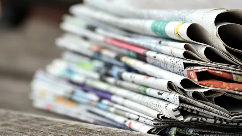Newspapers pile